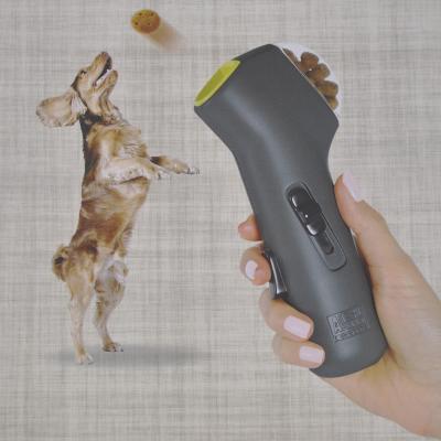 China Stored Interactive Dog Toy Rotation Pet Feeder Pet Treat Launcher Snack Feeder Pet Training Tool Cake Gun Training for sale