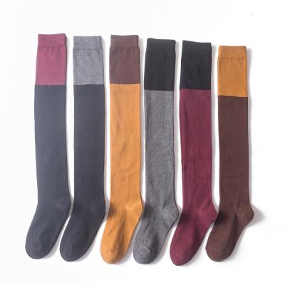 China Quentin Dropshipping Custom Logo Two Tone Color Sports Knee High Long QUICK DRY Socks For Women for sale