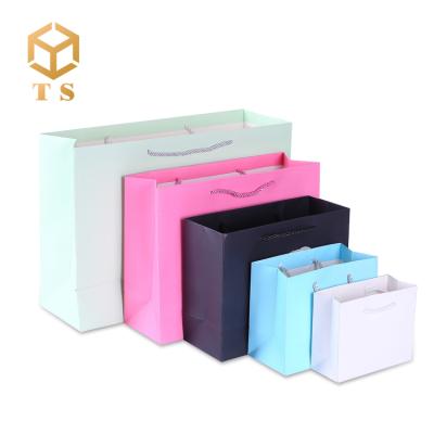 China Handmade Large Size Luxury Clothing Packaging Paper Bag With Your Own Logo Recycled Custom Paper Suitcase for sale