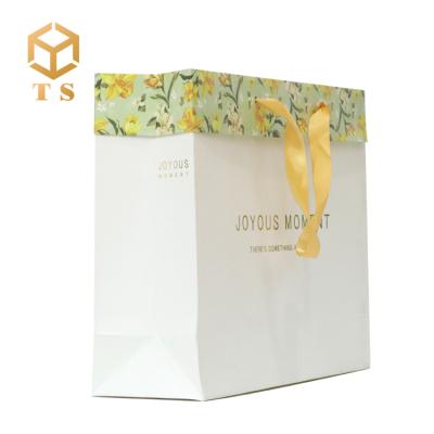 China Wholesale Recyclable Luxury Custom Foldable Clothing Shopping Bag Gift Foldable Paper Bag for sale