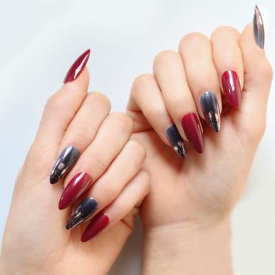 China Design 24 Pieces Nail Art Pieces Wine Red Almond Fake Nails Golden Metal Nail Pieces Adhesive Stickers for sale