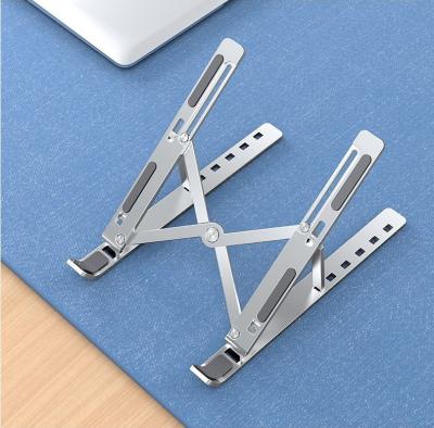 China Universal Lazy Cooling Ergonomic Vertical Adjustable Portable Foldable Aluminum Stand Laptop Fan Desk Stand Bracket Supplier for sale