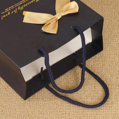 China Disposable Folding Custom Gift Wrapping Paper Box With Ribbon Premium Recycled Paper Box Packaging for sale