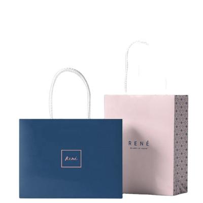 China Disposable Eco - Friendly Paper Gift Bag White Marble Paper Bags With Your Own Logo for sale