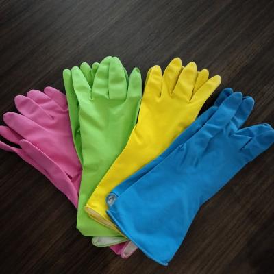 China Best Selling Eco - Friendly 50g Yellow Latex Household Gloves for sale