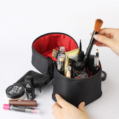 China Large Capacity Durable Portable Girls Travel Toiletry Bag Makeup Pouch Round Cosmetic Bag With Handle for sale