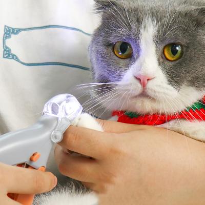 China Professional Nail Stocked Pet Nail Trimmer Pet Grooming Tool LED Pet Nail Clipper Dog Clippers for sale