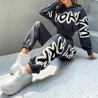 China Low Price QUICK DRY Letter Free Sample Textile Oti Drop Shoulder Hoodie And Sweatpants Set Women Streetwear Graphic Hoodies Sets for sale