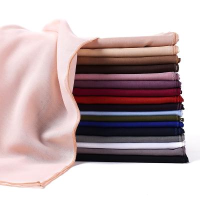 China Cheap Hijab Muslims New Design Solid Color Cotton Yarn Hijab Scarf Canvas Shawl Wholesale Monochromatic Muslim Cotton for sale