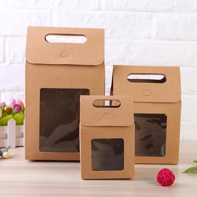 China Recyclable Transparent Paper Bag Window With Handle Paper Candy Gift Bag Small Gift Paper Bag for sale