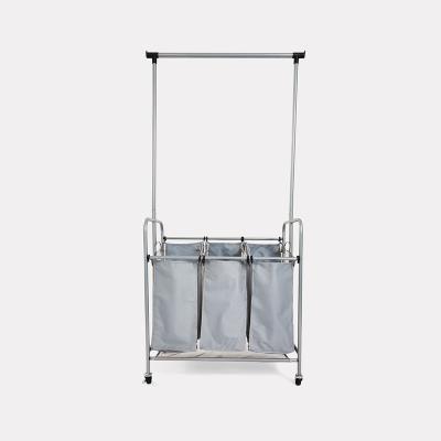 China Traditional Collapsible 3-Tier Laundry Basket Detachable Design Clothes Rack With 4 Rotating Wheels for sale