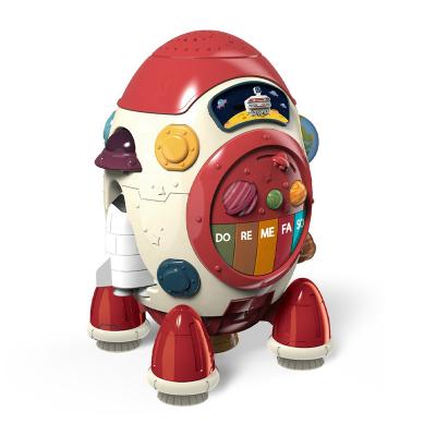 China newest design multifunctional education machine first rocket with colorful light music piano kids play 24*22*33.5CM for sale