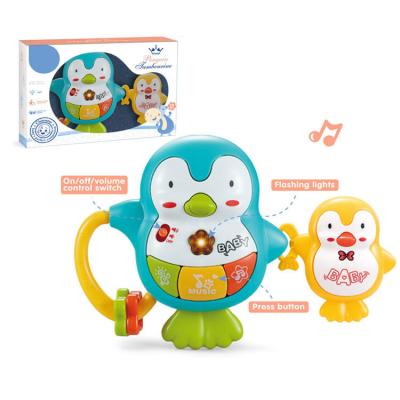 China Top Selling Electronic Musical Toys Baby Toys Gift Cute Music And Light Early Education Penguin Rattle for sale