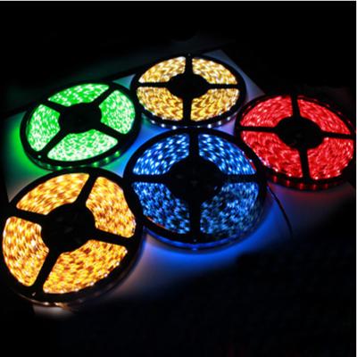 China PVC 2835/5050 RGB led strip light lamps 5m /roll beautiful colorful flexible strip lamps for bar/KTV/car/shop for sale