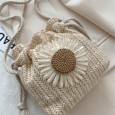 China New 2022 Fashion INS Bucket Purse Personality Girl One-shoulder Cute Weaving Messengers Summer Straw Wave Bags Wholesale for sale