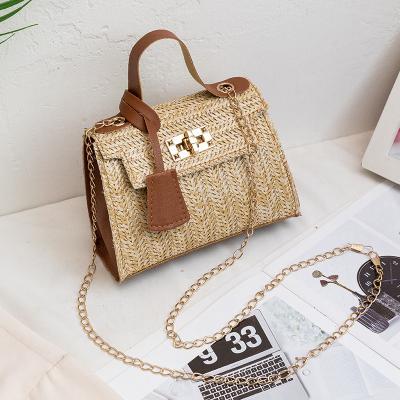 China 2022 Fashion Tassel Messenger Sling Retro Mobile Phone Women's New Ladies Clip Purses Straw Wave Bags for sale