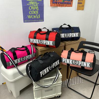 China Fashion Waterproof Fitness Travel Pink Women Handbag Large Capacity Storage Outdoor Women Sport Gym Duffel Bag for sale