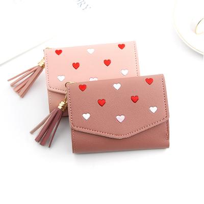 China Newest Style Waterproof Embroidery Tassel Mony Purse Small Slim Leather Coin Heart Shaped Wallet For Women for sale