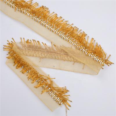 China Handmade Gold Spell Stock 28CM Laces 11inch Tassel Fringe Trimming Tube Gold Beaded Tube Tassel Lace LH-GPA0036 for sale