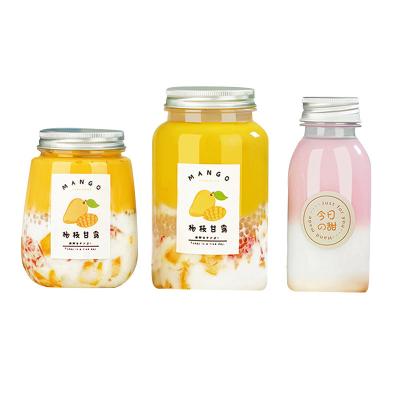 China Wholesale Disposable Beverage PET Transparent Creative Beverage Bottle With Lid Milk Plastic Tea Juice Bottle for sale