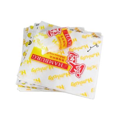 China Custom Logo Size Printed Grease Proof Wrapping Paper Food Fast Food Wrapping Paper Grease Proof Grease Coated Paper for sale