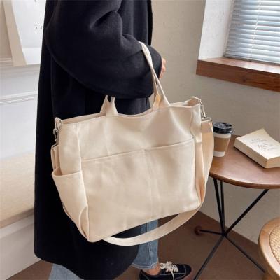 China 2022 Fashion Wholesale Cheap Bag Manufacturer Casual Women's Simple Girls Canvas Beige Canvas Handbags With Strap for sale