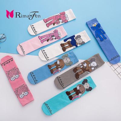 China Newest Fashion Men Women Sock Cartoon Doodle Pattern Breathable Sport Unisex Cotton Mid Crew Socks for sale