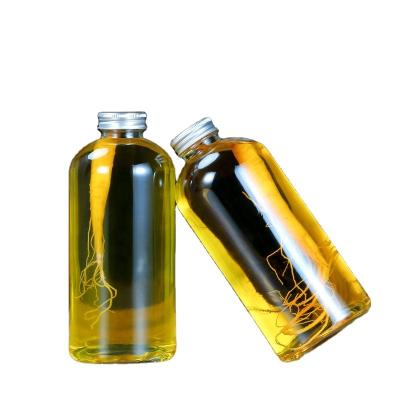 China Beverage Maker Sells 16oz Cylindrical Glass Juice Bottle With Screw Top Beverage Bottle for sale