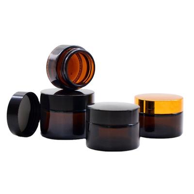 China High Quality Cosmetic Products 20g 30g 50g Cylindrical Glass Amber Cream Jar Cosmetic Bottle With Screw Cap for sale