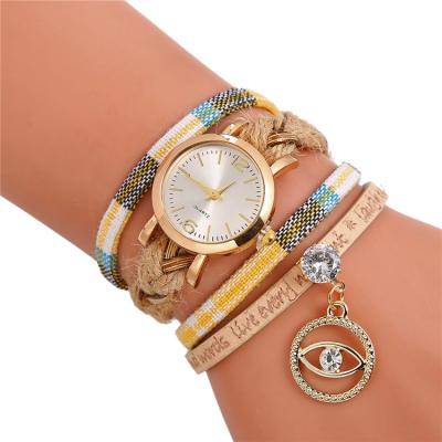 China Cheapest China Eye Watches Women Day/Date Gemstone Chain Luxury Gold Bracelet Watch Quartz Female Wristwatches for sale