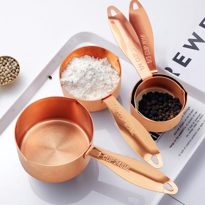 China Sustainable Measuring Cups Set Wholesale 4 Pieces Stainless Steel Copper Plated Kitchen Baking Tools Durable Measuring Rose Gold Stackable for sale