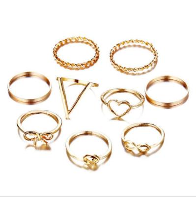 China Hollowed-out Simple 9pcs Knuckle Ring Set Creative Love Knot Bow Ring Punk Retro for sale