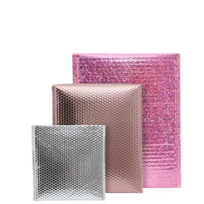 China Shock Resistance Christmas Charm Glossy Pink Bubble Envelope Mailing Bags Poly Plastic Metallic Foil Bubble Mailers Bag for sale