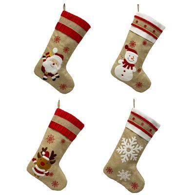 China 2021 Merry Christmas decoration wholesale Christmas candy gift bags decoration clothes bangs Santa Elk Snowman Snowflake Christmas canvas stocking for sale