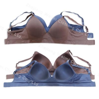 China Hot Sale Solid Color QUICK DRY Seamless Bra With Breast Pad Cup Back Button Large 3/4 Cup Lift Up Cup Bra for sale