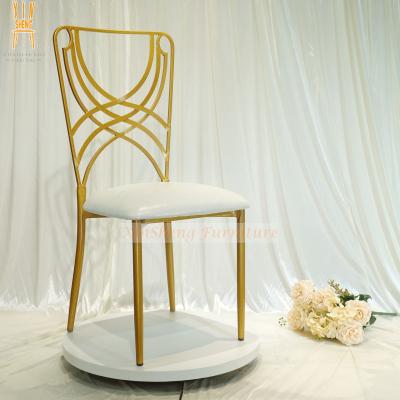 China Factory Direct Modern Golden Cross Back Cross Round Back Event Iron Dining Chair for sale