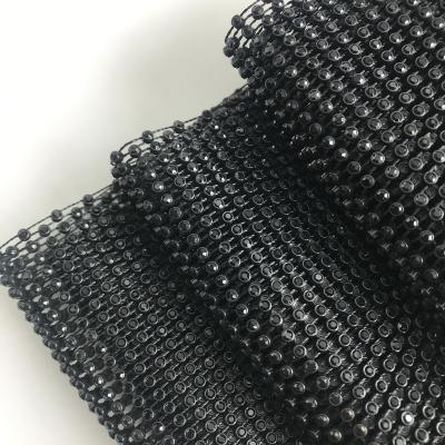 China Elastic Plastic Rhinestone Mesh Banding Fishnet Crystal Mesh Fabric Glitter Elastic Roll For Garment Shoes for sale