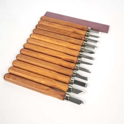 China Wood Work 12 Pieces Hand Woodworking Chisel Tool Kit Carbon Steel Cutting Blades Wood Carving Tools With Bag for sale