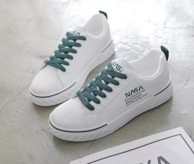 China Latest New Arrival Classic Activies Outdoor Design Women Fashion Sneakers Trendy White Casual Shoes For Women for sale