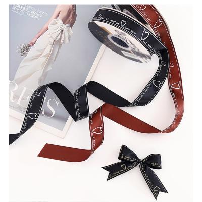 China Luster Yiwu Factory Wholesale Korean Style 2.5cm*50Y Heart Smooth Customized Satin Printed Ribbon for sale