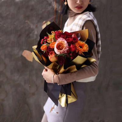 China Biodegradable hot sale double sided with gold bouquet 100%waterproof Korean fresh flower wrapping paper for sale