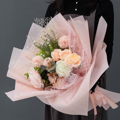 China Yiwu Factory Wholesale Biodegradable Flower Bouquet Wrapping Paper Korean Fashion Waterproof Matte 100% Waterproof for sale