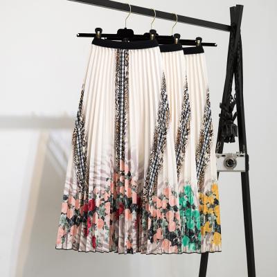 China Women's Empire Polyester Anti-static Floral Printing Skirts Fashion Cartoon Elastic Waist A-Line Pleated Skirt for sale