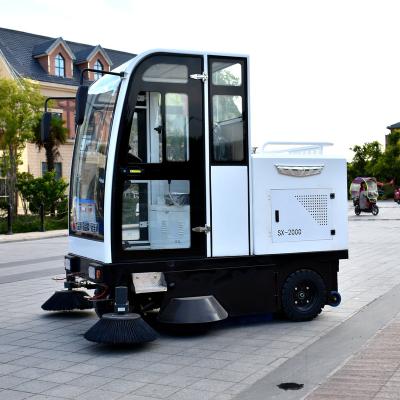 China Passenger Fully Enclosed Cabin Sweeper Vacuum Cleaner Electric Road Sweeper Street Vacuum Sweeper for sale