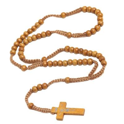 China FASHIONABLE Cheap Cross Necklace Jewelry Wooden Rosaries Colored Handmade Woven Wood Beads Rosary Necklaces for sale