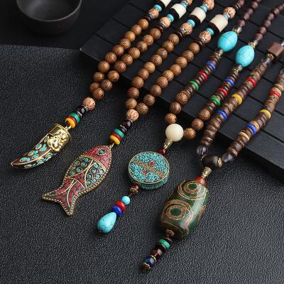 China Trendy Handmade Turquoise Long Necklace Vintage Jewelry Fashion Pendant Wood Beads Necklace For Women for sale