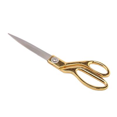 China Stainless Steel Handle 10.5 Inch Heavy Duty Professional Gold Tailor's Zine-Alloy Scissors for sale