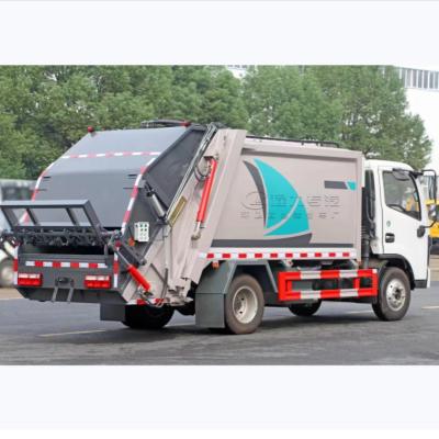 China Compactor eléctrico de acero al carbono Camión de basura 8280 kg Peso bruto del vehículo en venta