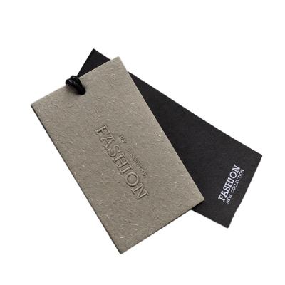 China Wholesale Custom Made Luxury Paper Embossed Swing Garment Embossed Hang Tag For Apparel Viable for sale