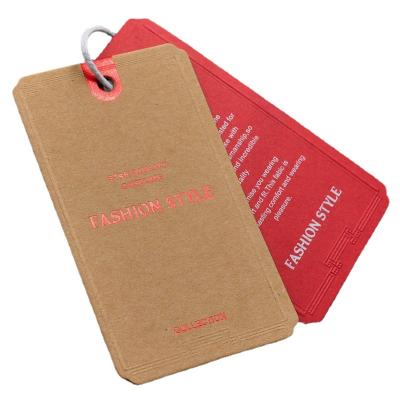 China Sustainable Custom Clothing Hang Tags With String Embosse Logo Design Garment Paper Hangtag Labels for sale